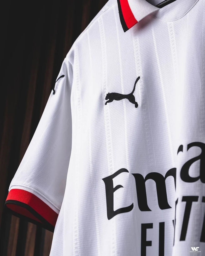 AC Milan away jersey 2024-25 featuring a sleek white design with Puma branding and red accents