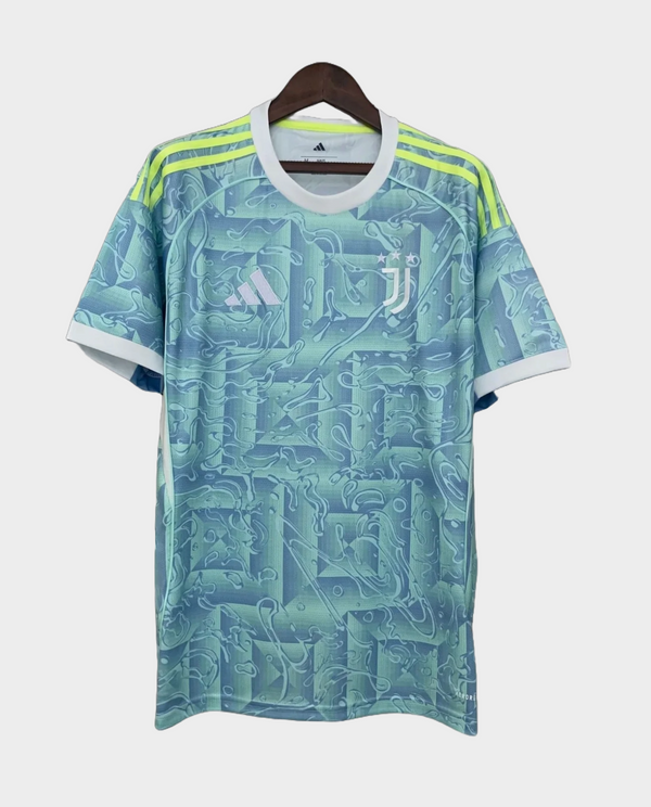 Juventus away jersey 25-26 with light blue geometric pattern and neon yellow stripes from The Dribble Store