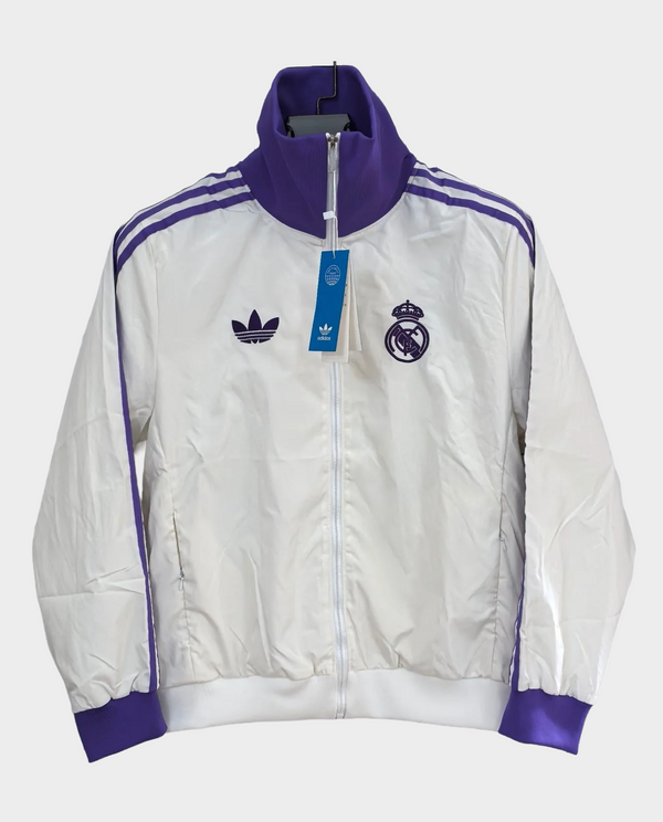 The Dribble Store Madrid windbreaker jacket 2025 in white and purple with team logo and sleek design