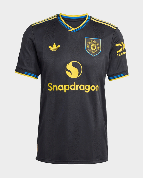 The Dribble Store Manchester United 2025-26 third jersey black with club crest and yellow Snapdragon sponsor logo blue yellow trim