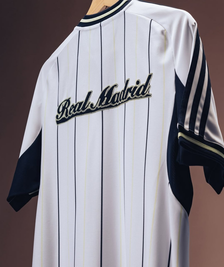 The Dribble Store Real Madrid special edition jersey 2025-26 white pinstripe back with navy sleeve stripes and script logo