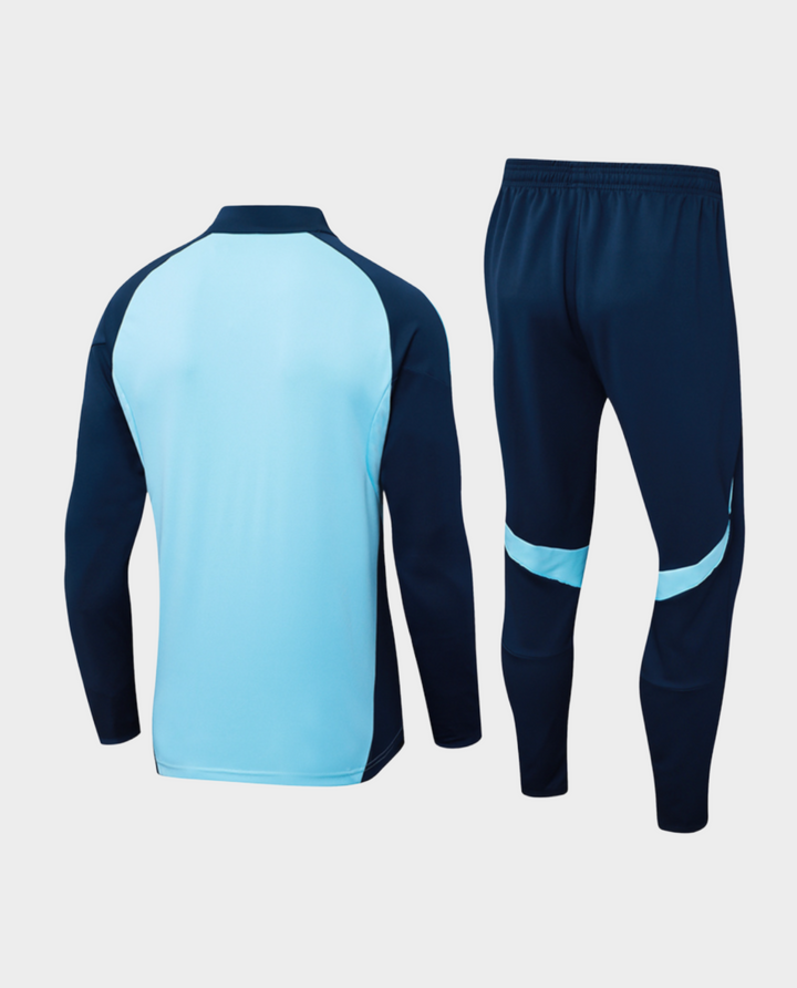 The Dribble Store Arsenal blue training suit 2025-26 with stylish design and comfortable fit for athletes