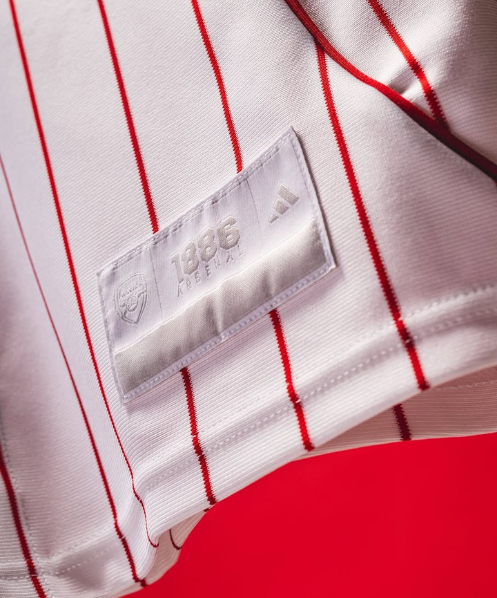 Arsenal US Pack shirt 2025-26 special edition featuring authentic Adidas branding and distinctive stripes