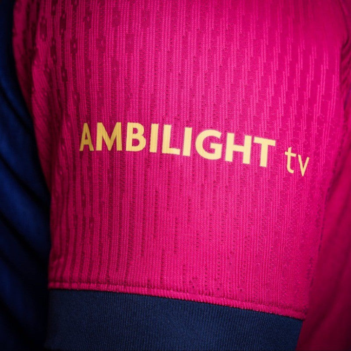 Detailed view of the Barcelona Home Jersey 2024 featuring the AMBILIGHT tv logo on the sleeve