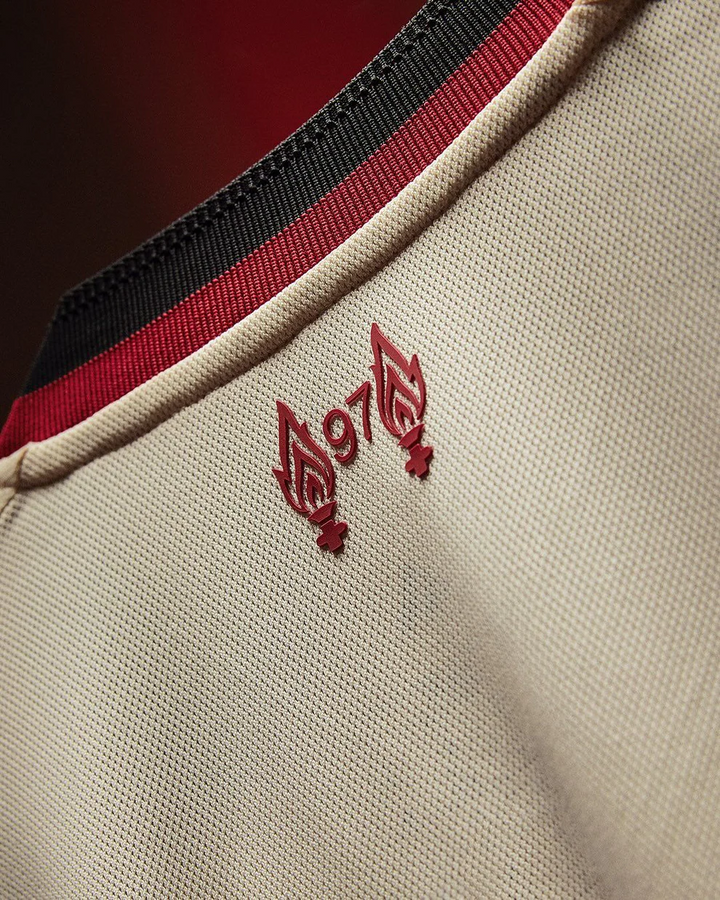 Close-up of Liverpool away jersey 2025-26 full sleeve featuring embroidered details and fabric texture