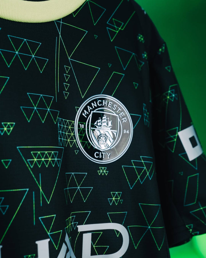 Manchester City Fourth Jersey 2025-26 featuring a unique geometric pattern and club logo