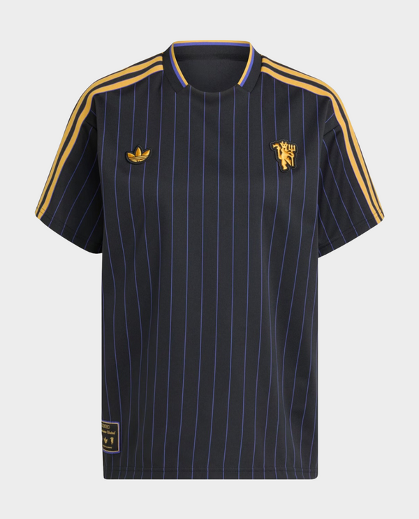 The Dribble Store Manchester United Terrace Icon jersey 2025-26 in navy with gold stripes and logo