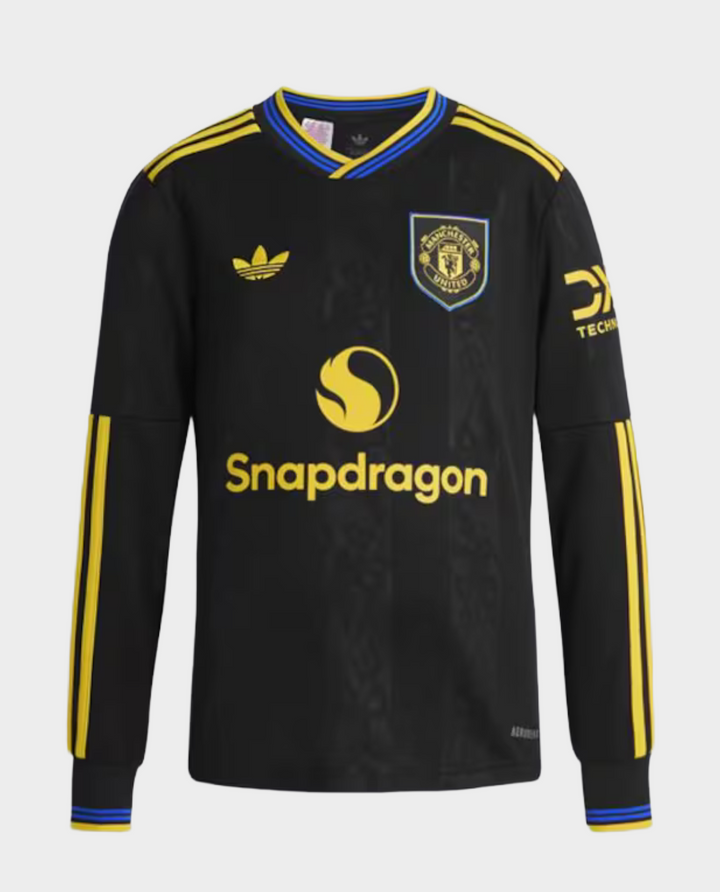 Manchester United third jersey 2025-26 in black with yellow accents and emblem from The Dribble Store