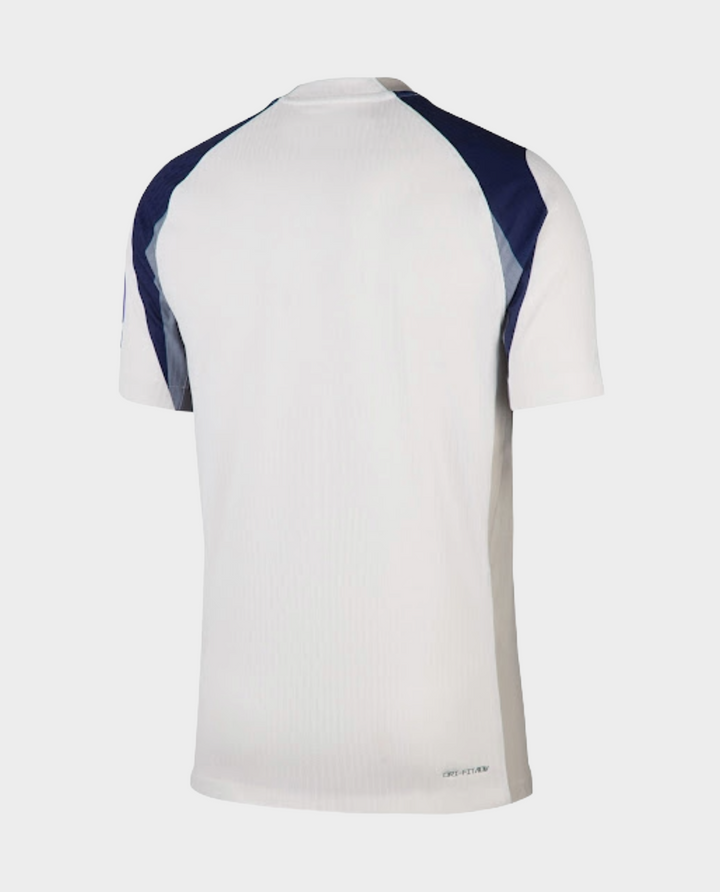 The Dribble Store white back view of Tottenham Hotspur 2025 home jersey with navy shoulder panels and light gray side panels