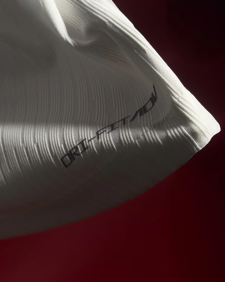 The Dribble Store close up of Tottenham Hotspur 2025 home jersey white textured sleeve with Dri FIT fabric