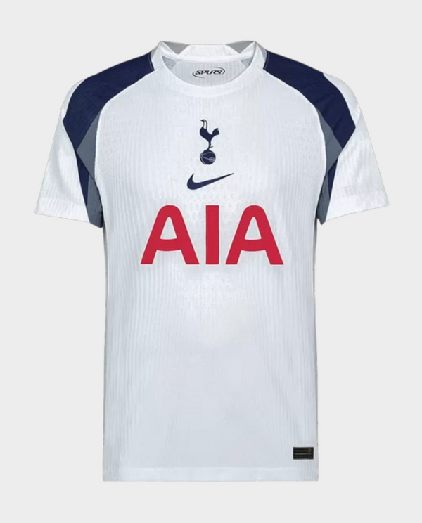 The Dribble Store Tottenham Hotspur 2025 home jersey white Nike shirt with navy shoulder panels and red AIA sponsor logo