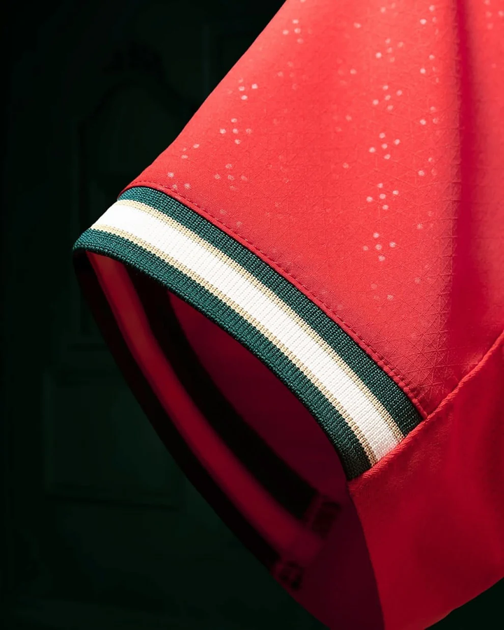 Close-up of Portugal home jersey 2025-26 Player Version with detailed sleeve design and vibrant red color
