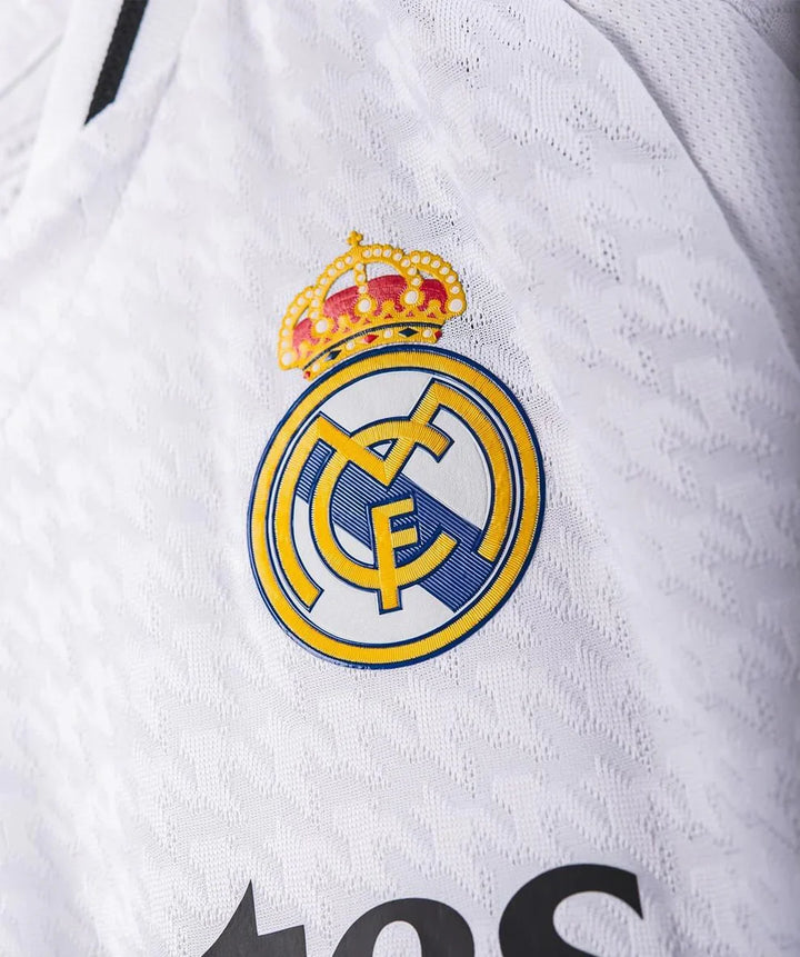 Real Madrid 2024 home jersey with iconic crest and detailed fabric design by Striker Store