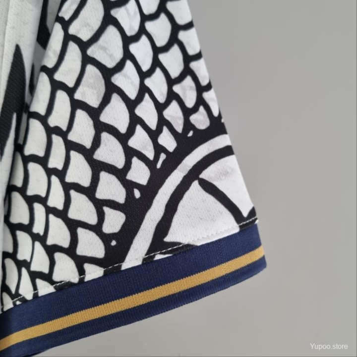 Real Madrid Dragon Jersey featuring a unique dragon design and high-quality fabric detail